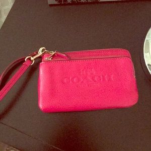 Coach wristlet, hot pink/ fuschia, hardly used.